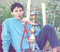 Cyrus in Tehran smoking water pipe