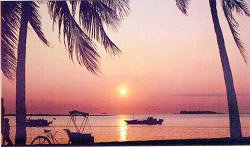 A red sunset typical of one of the 17,508 islands, this one in Menado some 5 hours jet flight from Jakarta